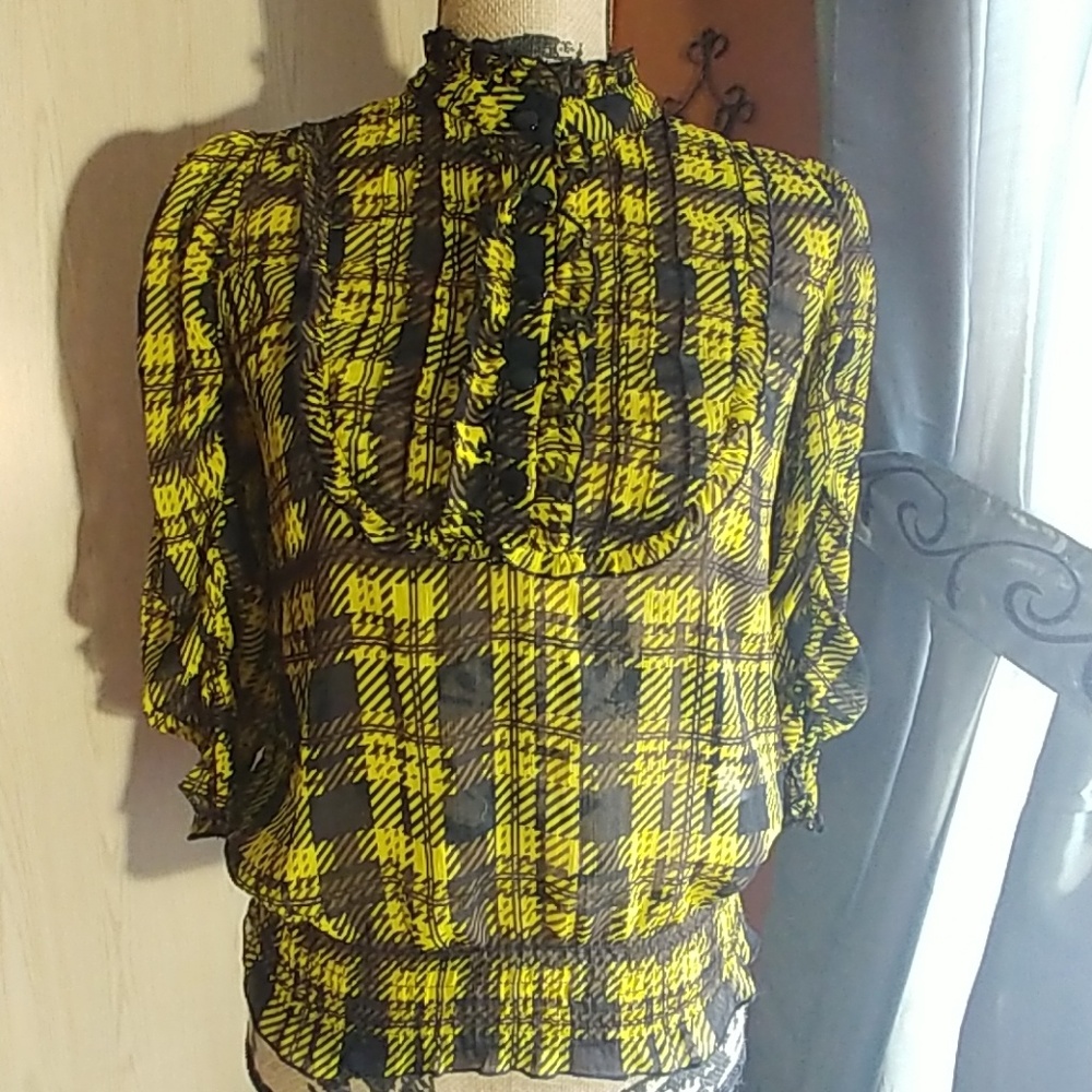 Miley Cyrus Max Azria black yellow blouse